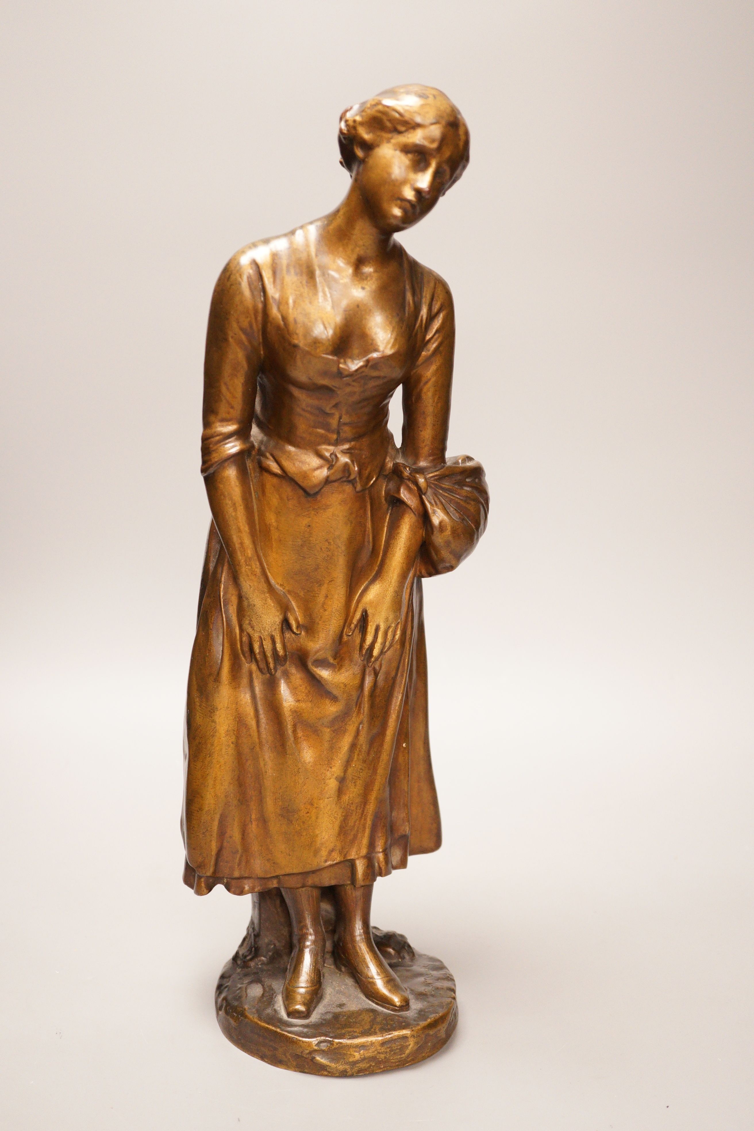 Antonin Mercie (French 1845-1916) - a late 19th century gilt bronze study of a standing female. ‘FONDU PAR SIOT DECAUVILLE ORIGINAL’ stamped to base rim, 41.5cm tall